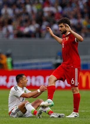 Mexico vs. Russia SAO PETERSBURGO, MO - 24.06.2017: MEXICO VS. RUSSIA - HERNANDEZ Javier of Mexico and DZHIKYA Georgy of Russia coil during Mexico-Russia match valid for the third round of the Confederations Cup 2017 on Saturday (24) held Arena Kazan in Kazan, Russia. (Photo: Marcelo Machado de Melo Fotoarena) x1343576x  MarceloxMachadoxdexMelo