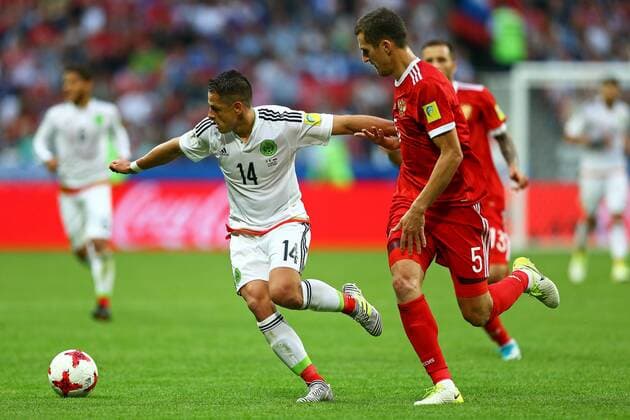 Mexico vs. Russia SAO PETERSBURGO, MO - 24.06.2017: MEXICO VS. RUSSIA - Javier Hernandez of Mexico contests bid with Vasin Viktor of Russia during a match between Mexico and Russia valid for the third round of the Confederations Cup 2017 on Saturday (24), held at the Kazan Arena in Kazan, Russia. (Photo: Heuler Andrey DiaEsportivo Fotoarena) x1343583x  HeulerxAndrey