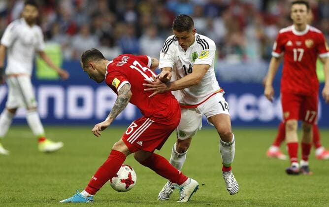 Mexico vs. Russia SAO PETERSBURGO, MO - 24.06.2017: MEXICO VS. RUSSIA - Fedor KUDRIASHOV of Russia fights ball with HERNANDEZ Javier of Mexico during a match between Mexico and Russia valid for the third round of the Confederations Cup 2017 on Saturday (24) held at Kazan Arena Stadium in Kazan, Russia. (Photo: Rodolfo Buhrer La Imagem Fotoarena) x1343606x  RodolfoxBuhrer