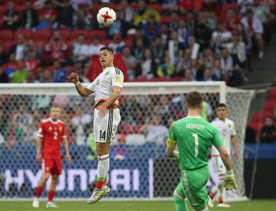 KAZAN, RUSSIA - JUNE 24, 2017: Mexico s Javier Hernandez (L), and Russia s goalkeeper Igor Akinfeyev (1) in their 2017 FIFA Confederations Cup First Stage Group A football match at Kazan Arena Stadium; Mexico won the game 2-1. Yegor Aleyev TASS  TS054A34