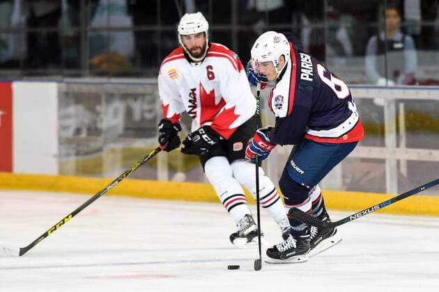 24th June 2017; Hisense Arena, Melbourne, Victoria, Australia; Hungry Jack International Ice hockey Eishockey challenge, Canada versus USA; Brett Ponich of Canada and Tom Parisi of the USA competing for the puck xMorganxHancockx  ActionPlus11893864