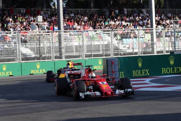 Azerbaijan Grand Prix, Baku 22 - 25 June 2017 25.06.2017 - Race, Sebastian Vettel (GER) Scuderia Ferrari SF70H leads Daniel Ricciardo (AUS) Red Bull Racing RB13 