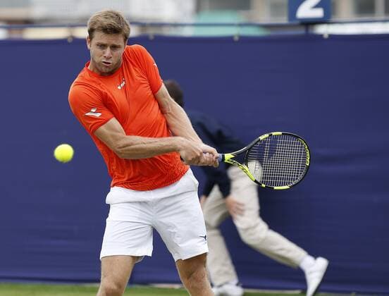 June 28th 2017, Devonshire Park, Eastbourne, England; Aegon International Eastbourne; ; Mischa Zverev (GER) versus Ryan Harrison (USA); Harrison hits a backhand; Zverev won the 1st round match 6-4 7-6 xHongboxChenx  ActionPlus11894992