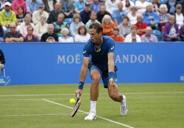June 28th 2017, Devonshire Park, Eastbourne, England; Aegon International Eastbourne; ; Novak Djokovic (SRB) versus Vasek Pospisil (CAN); Pospisil hits a backhand; Djokovic won his 2nd round match 6-4 6-3 xHongboxChenx  ActionPlus11894952