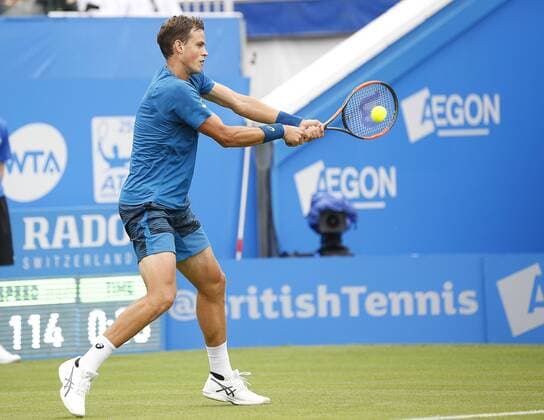 June 28th 2017, Devonshire Park, Eastbourne, England; Aegon International Eastbourne; ; Novak Djokovic (SRB) versus Vasek Pospisil (CAN); Pospisil hits a backhand; Djokovic won his 2nd round match 6-4 6-3 xHongboxChenx  ActionPlus11894957