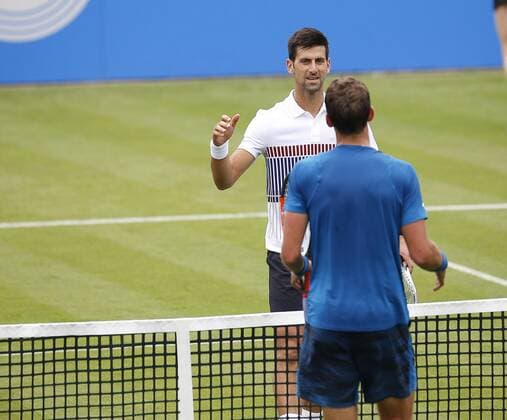 June 28th 2017, Devonshire Park, Eastbourne, England; Aegon International Eastbourne; ; Novak Djokovic (SRB) versus Vasek Pospisil (CAN); Djokovic shakes hands with Pospisil; Djokovic won the 2nd round match 6-4 6-3 xHongboxChenx  ActionPlus11894983
