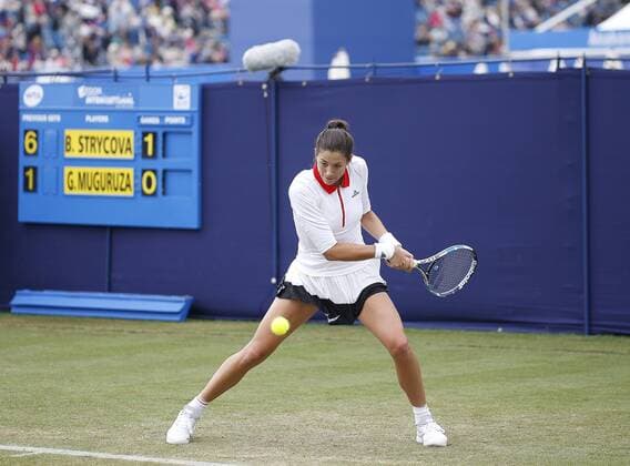 June 28th 2017, Devonshire Park, Eastbourne, England; Aegon International Eastbourne; Day 3; Garbine Muguruza (ESP) versus Barbora Strycova (CZE); Muguruza hits a backhand; Strycova won her 2nd round match 6-1 6-0 xHongboxChenx  ActionPlus11895061