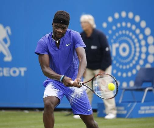June 28th 2017, Devonshire Park, Eastbourne, England; Aegon International Eastbourne; Day 3; Richard Gasquet (FRA) versus Fances Tiafoe (USA); Tiafoe hits a backhand; Gasquet won his 1st round match 5-7 7-6 6-3 xHongboxChenx  ActionPlus11895039