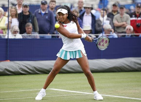 June 28th 2017, Devonshire Park, Eastbourne, England; Aegon International Eastbourne; Day 3; Caroline Wozniacki (DEN) versus Naomi Osaka (JPN); Naomi hits a backhand; Wozniacki won her 2nd round match 6-2 7-6 xHongboxChenx  ActionPlus11895043