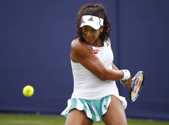 June 28th 2017, Devonshire Park, Eastbourne, England; Aegon International Eastbourne; Day 3; Caroline Wozniacki (DEN) versus Naomi Osaka (JPN); Naomi hits a backhand; Wozniacki won her 2nd round match 6-2 7-6 xHongboxChenx  ActionPlus11895044
