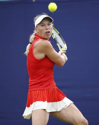 June 28th 2017, Devonshire Park, Eastbourne, England; Aegon International Eastbourne; Day 3; Caroline Wozniacki (DEN) versus Naomi Osaka (JPN); Wozniacki hits a backhand; Wozniacki won her 2nd round match 6-2 7-6 xHongboxChenx  ActionPlus11895047