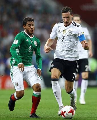Germany vs Mexico SOCHI, SC - 29.06.2017: GERMANY VS MEXICO - Julian Draxler of Germany is bidding with Mexico& 39;s Jonathan Dos Santos during a match between Germany and Mexico in the semifinals of the 2017 FIFA Confederns Cup on Thn Thursday at the Sochi Olympic Stadium in Sochi, Russia. (Photo: Heuler Andrey DiaEsportivo Fotoarena) x1347265x  HeulerxAndrey