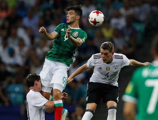 Germany vs Mexico SOCHI, SC - 29.06.2017: GERMANY VS MEXICO - JIMENEZ Raul of Mexico contests ball with GINTER Matthias and RUDY Sebastian of Germany during a match between Germany and Mexico valid for the semifinal of the Confederations Cup 2017 on Thursday (29), held at the Olympic Stadium in Sochi, Russia (Photo: Marcelo Machado de Melo Fotoarena) x1347273x  MarceloxMachadoxdexMelo