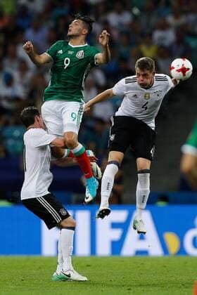 Germany vs Mexico SOCHI, SC - 29.06.2017: GERMANY VS MEXICO - JIMENEZ Raul of Mexico contests ball with GINTER Matthias and RUDY Sebastian of Germany during a match between Germany and Mexico valid for the semifinal of the Confederations Cup 2017 on Thursday (29), held at the Olympic Stadium in Sochi, Russia (Photo: Marcelo Machado de Melo Fotoarena) x1347274x  MarceloxMachadoxdexMelo