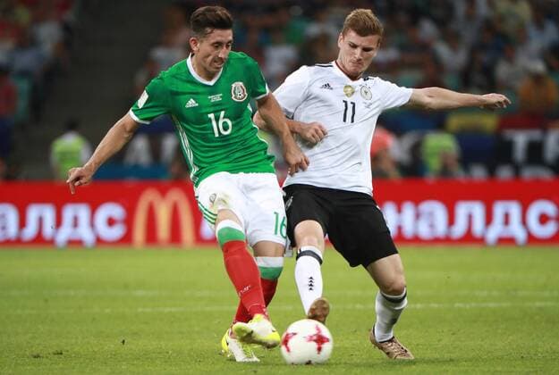 SOCHI, RUSSIA - JUNE 29, 2017: Mexico s Hector Herrera (L) and Germany s Timo Werner fight for the ball in their 2017 FIFA Confederations Cup semifinal football match at Fisht Stadium. Sergei Fadeichev TASS  TS0557E4