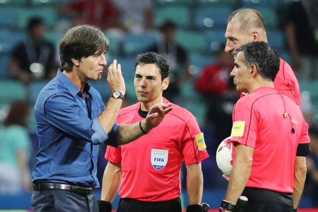 SOCHI, RUSSIA - JUNE 29, 2017: Germany s head coach Joachim Low (L) talks to referees after the 2017 FIFA Confederations Cup semifinal football match against Mexico at Fisht Stadium. Germany won the game 4-1. Artyom Korotayev TASS  TS05585D