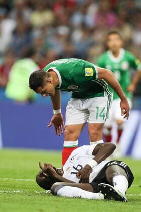 (170630) -- SOCHI, June 30, 2017 -- Javier Hernandez (top) of Mexico reacts while Germany s Antonio Ruediger lying on the pitch during the semifinal match of the 2017 FIFA Confederations Cup in Sochi, Russia, June 29, 2017. Mexico lost 1-4. ) (SP)RUSSIA-SOCHI-2017 FIFA CONFEDERATIONS CUP-SEMIFINAL-GER VS MEX WuxZhuang 