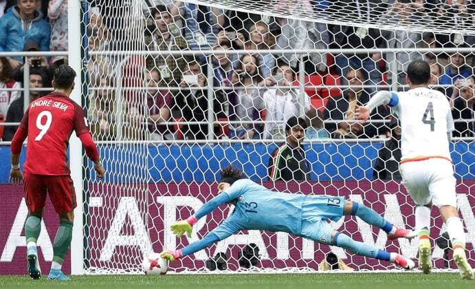MOSCOW, RUSSIA â€“ JULY 2, 2017: Mexicoâ€™s goalkeeper Guillermo Ochoa (C) makes a save in their 2017 FIFA Confederations Cup third place football match against Cameroon at Otkrytie Arena. Mikhail Japaridze TASS  TS055C56