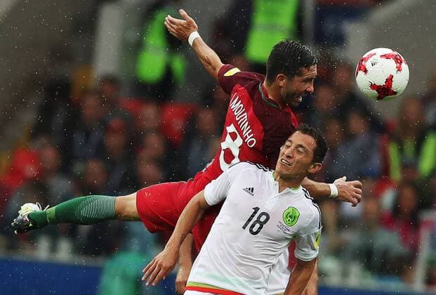 MOSCOW, RUSSIA â€“ JULY 2, 2017: Portugalâ€™s Joao Moutinho (back) and Mexicoâ€™s Andres Guardado struggle for the ball in their 2017 FIFA Confederations Cup third place football match at Otkrytie Arena. Sergei Savostyanov TASS  TS055C5F