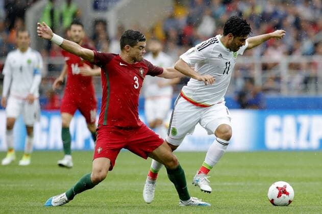 MOSCOW, RUSSIA â€“ JULY 2, 2017: Mexicoâ€™s Pepe (L) and Portugalâ€™s Carlos Vela struggle for the ball in their 2017 FIFA Confederations Cup third place football match at Otkrytie Arena. Mikhail Japaridze TASS  TS055C62