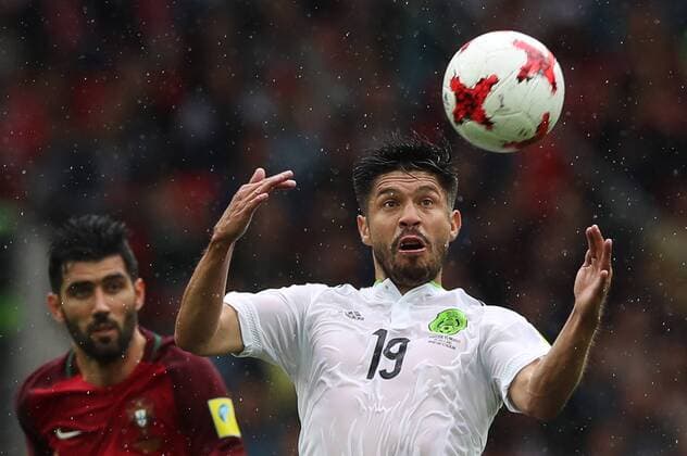 MOSCOW, RUSSIA â€“ JULY 2, 2017: Mexicoâ€™s Oribe Peralta (R) and Portugalâ€™s Luis Neto struggle for the ball in their 2017 FIFA Confederations Cup third place football match at Otkrytie Arena. Sergei Savostyanov TASS  TS055C68