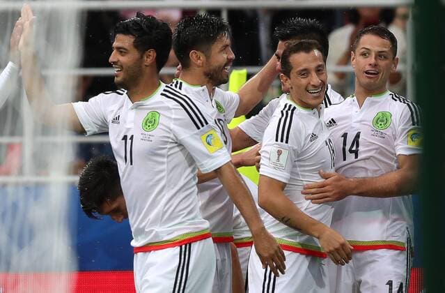 MOSCOW, RUSSIA â€“ JULY 2, 2017: Mexicoâ€™s Carlos Vela, Oribe Peralta, Andres Guardado, and Javier Hernandez (L-R) celebrate scoring against Portugal in their 2017 FIFA Confederations Cup third place football match at Otkrytie Arena. Sergei Savostyanov TASS  TS055C70