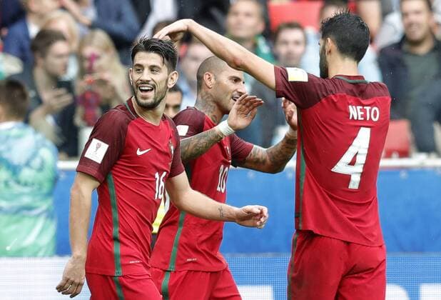 MOSCOW, RUSSIA â€“ JULY 2, 2017: Portugalâ€™s Pizzi, Ricardo Quaresma, and Luis Neto (L-R) celebrate scoring against Mexico in their 2017 FIFA Confederations Cup third place football match at Otkrytie Arena. Mikhail Japaridze TASS  TS055C84