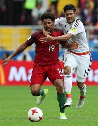 MOSCOW, RUSSIA â€“ JULY 2, 2017: Portugalâ€™s Eliseu (L) and Mexicoâ€™s Carlos Vela struggle for the ball in their 2017 FIFA Confederations Cup third place football match at Otkrytie Arena. Sergei Savostyanov TASS  TS055C8B