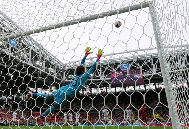 MOSCOW, RUSSIA â€“ JULY 2, 2017: Mexico s goalkeeper Guillermo Ochoa reaching for the ball in their 2017 FIFA Confederations Cup third place football match against Portugal at Spartak Stadium. Portugal won the game 2-1 in extra time and claimed bronze medals. Sergei Savostyanov TASS  TS055C9F