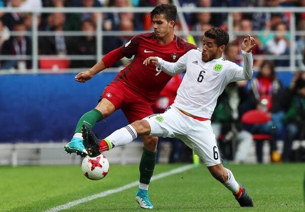 MOSCOW, RUSSIA â€“ JULY 2, 2017: Portugal s Andre Silva (L) and Mexico s Jonathan dos Santos fight for the ball in their 2017 FIFA Confederations Cup third place football match at Spartak Stadium. Portugal won the game 2-1 in extra time and claimed bronze medals. Sergei Savostyanov TASS  TS055CB2