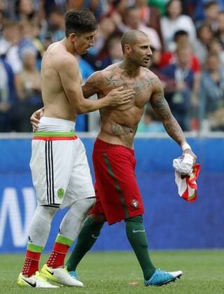 MOSCOW, RUSSIA â€“ JULY 2, 2017: Mexico s Hector Herrera (L) and Portugal s Ricardo Quaresma exchange shirts in their 2017 FIFA Confederations Cup third place football match at Spartak Stadium. Portugal won the game 2-1 in extra time and claimed bronze medals. Mikhail Japaridze TASS  TS055CA5