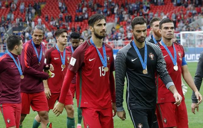 MOSCOW, RUSSIA â€“ JULY 2, 2017: Portugal s Andre Gomes, goalkeeper Rui Patricio, and Pepe (L-R front) pose with their bronze medals at an awards ceremony after winning their 2017 FIFA Confederations Cup third place football match against Mexico at Spartak Stadium. Portugal won the game 2-1 in extra time and claimed bronze medals. Mikhail Japaridze TASS  TS055CC6