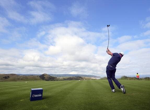 July 5th 2017, Portstewart Golf Club, Portstewart, Northern Ireland; Dubai Duty Free Irish Open Golf Championship; Pro-Am Tournament; Graeme McDowell (NIR) plays from the 1st tee xNigelxCookex  ActionPlus11897933