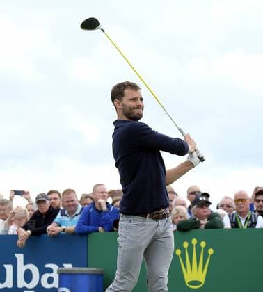 July 5th 2017, Portstewart Golf Club, Portstewart, Northern Ireland; Dubai Duty Free Irish Open Golf Championship; Pro-Am Tournament; Actor Jamie Dornan looks on as his 1st tee shot pulls wide xNigelxCookex  ActionPlus11897958