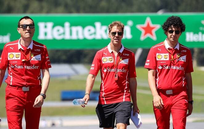 FORMULA 1 - GP of Austria 2017 SPIELBERG,AUSTRIA,06.JUL.17 - MOTORSPORTS, FORMULA 1 - Grand Prix of Austria, Red Bull Ring, preview. Image shows Sebastian Vettel (GER Ferrari) with teammembers. GEPAxpictures xChristianxWalgram