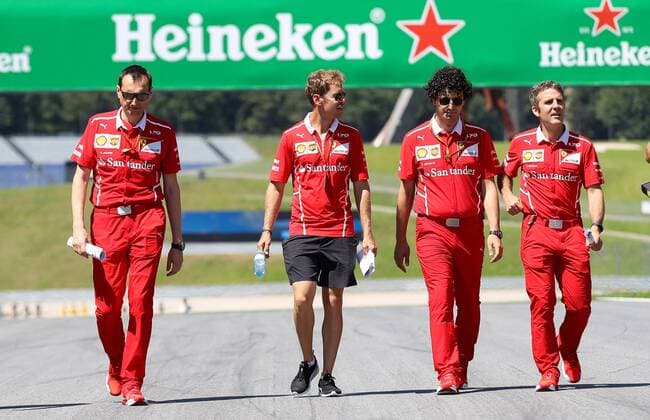 FORMULA 1 - GP of Austria 2017 SPIELBERG,AUSTRIA,06.JUL.17 - MOTORSPORTS, FORMULA 1 - Grand Prix of Austria, Red Bull Ring, preview. Image shows Sebastian Vettel (GER Ferrari) with teammembers. GEPAxpictures xChristianxWalgram