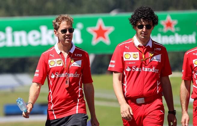 FORMULA 1 - GP of Austria 2017 SPIELBERG,AUSTRIA,06.JUL.17 - MOTORSPORTS, FORMULA 1 - Grand Prix of Austria, Red Bull Ring, preview. Image shows Sebastian Vettel (GER Ferrari) with teammembers. GEPAxpictures xChristianxWalgram