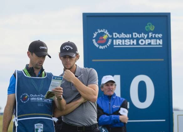 July 6th 2017, Portstewart Golf Club, Portstewart, Northern Ireland; Dubai Duty Free Irish Open Golf Championship; Day 1; Thomas Pieters (BEL) discusses the 10th with his caddy xNigelxCookex  ActionPlus11898239