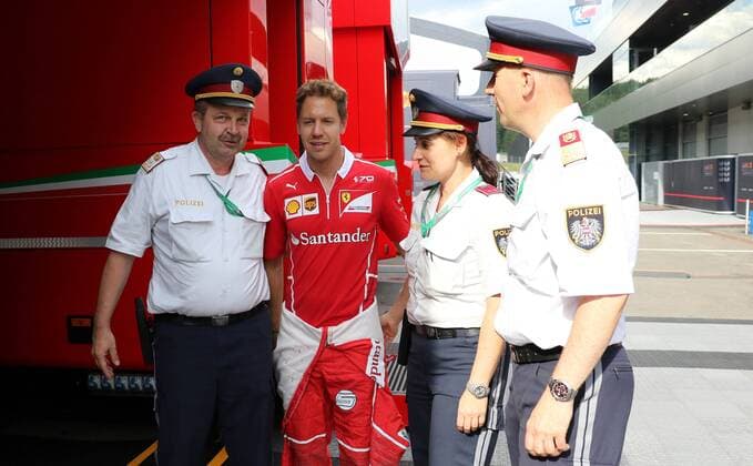 Sebastian Vettel, Scuderia Ferrari, mit Polizei, formula 1 GP, Austria in Spielberg, 06.07.2017 Photo:mspb Thomas Melzer Sebastian Vettel, mit Polizei, formula 1 GP, Austria