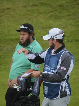 July 6th 2017, Portstewart Golf Club, Portstewart, Northern Ireland; Dubai Duty Free Irish Open Golf Championship; Day1; Andrew Johnson (ENG) discusses his next shot with his caddy xNigelxCookex  ActionPlus11898290
