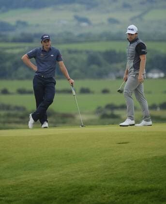 July 6th 2017, Portstewart Golf Club, Portstewart, Northern Ireland; Dubai Duty Free Irish Open Golf Championship; Day1; Paul Dunne (IRL) on the left lines up the putt on the 6th xNigelxCookex  ActionPlus11898291
