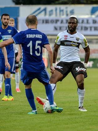SOCCER - UEFA EL quali, Altach vs Chikhura ALTACH,AUSTRIA,06.JUL.17 - SOCCER - UEFA Europa League qualification, SCR Altach vs FC Chikhura Sachkhere. Image shows Shota Kashia (Chikhura) and Louis Clement Ngwat Mahop (Altach). GEPAxpictures xOliverxLerch