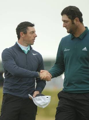 July 7th 2017, Portstewart Golf Club, Portstewart, Northern Ireland; Dubai Duty Free Irish Open Golf Championship, Day 2; Rory McIlroy (NIR) shakes hands with John Rahm (USA) at the end of their round. xNigelxCookex  ActionPlus11898570