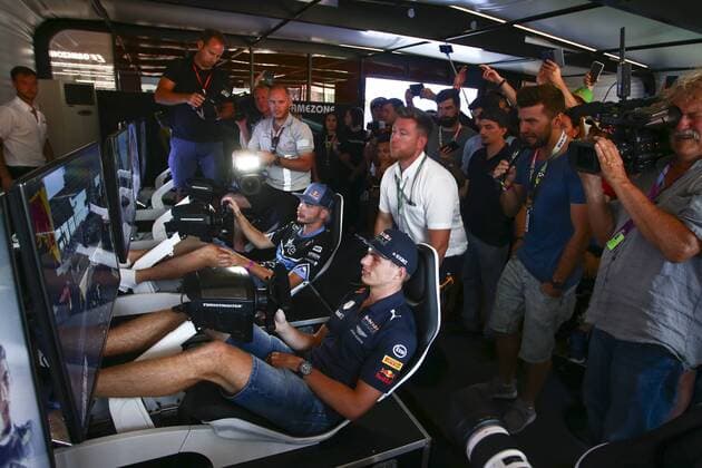 FORMULA 1 - GP of Austria 2017 SPIELBERG,AUSTRIA,07.JUL.17 - MOTORSPORTS, FORMULA 1 - Grand Prix of Austria, Red Bull Ring, free practice. Image shows Max Verstappen (NED Red Bull Racing) and Red Bull eGamer hakkiJunior Erik Lestach. GEPAxpictures xFelixxRoittner