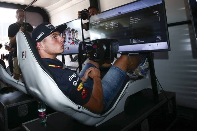 FORMULA 1 - GP of Austria 2017 SPIELBERG,AUSTRIA,07.JUL.17 - MOTORSPORTS, FORMULA 1 - Grand Prix of Austria, Red Bull Ring, free practice. Image shows Max Verstappen (NED Red Bull Racing) and Red Bull eGamer hakkiJunior Erik Lestach. GEPAxpictures xFelixxRoittner
