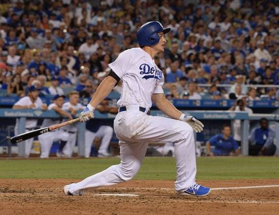 Los Angeles Dodgers Chase Utley connects with a single in the fourth inning against the Kansas City Royals at Dodger Stadium in Los Angeles on July 7, 2017. The Dodgers defeated the Royals 4-1.  LAP2017070707 JIMxRUYMEN