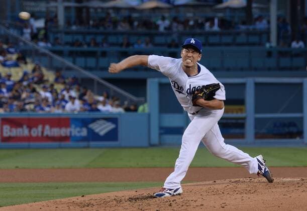 Los Angeles Dodgers starting pitcher Kenta Maeda delivers in the third inning against the Kansas City Royals at Dodger Stadium in Los Angeles on July 7, 2017. Maeda turned in five innings of one-run baseball before bequeathing a one-run lead to the bullpen. The Dodgers defeated the Royals 4-1.  LAP2017070722 JIMxRUYMEN