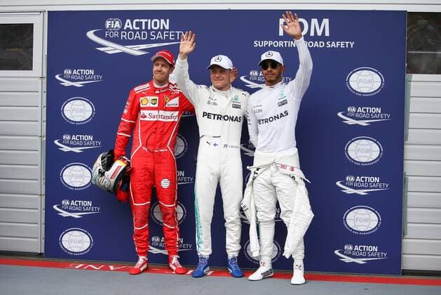 FORMULA 1 - GP of Austria 2017 SPIELBERG,AUSTRIA,08.JUL.17 - MOTORSPORTS, FORMULA 1 - Grand Prix of Austria, Red Bull Ring, qualifying. Image shows the rejoicing of Sebastian Vettel (GER Ferrari), Valtteri Bottas (FIN Mercedes) and Lewis Hamilton (GBR Mercedes). GEPAxpictures xDanielxGoetzhaber