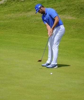 July 8th 2017, Portstewart Golf Club, Portstewart, Northern Ireland; Dubai Duty Free Irish Open Golf Championship, Day 3; John Rahm (USA) fails to find the hole on the 3rd during the third round of the Dubai Duty Free Irish Open; Rahm presently holds the lead towards the end of the 3rd round xNigelxCookex  ActionPlus11898981