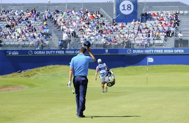 July 8th 2017, Portstewart Golf Club, Portstewart, Northern Ireland; Dubai Duty Free Irish Open Golf Championship, Day 3; Padraig Harrington (IRL) acknowledges the grandstand crowd as he makes his way towards the 18th green during the third round of the Dubai Duty Free Irish Open xNigelxCookex  ActionPlus11898994
